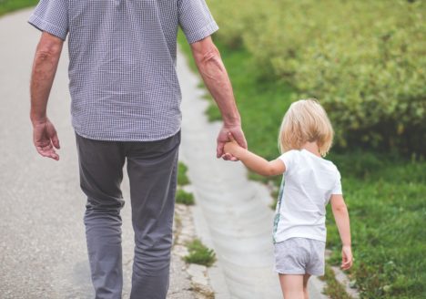 Man walks with child